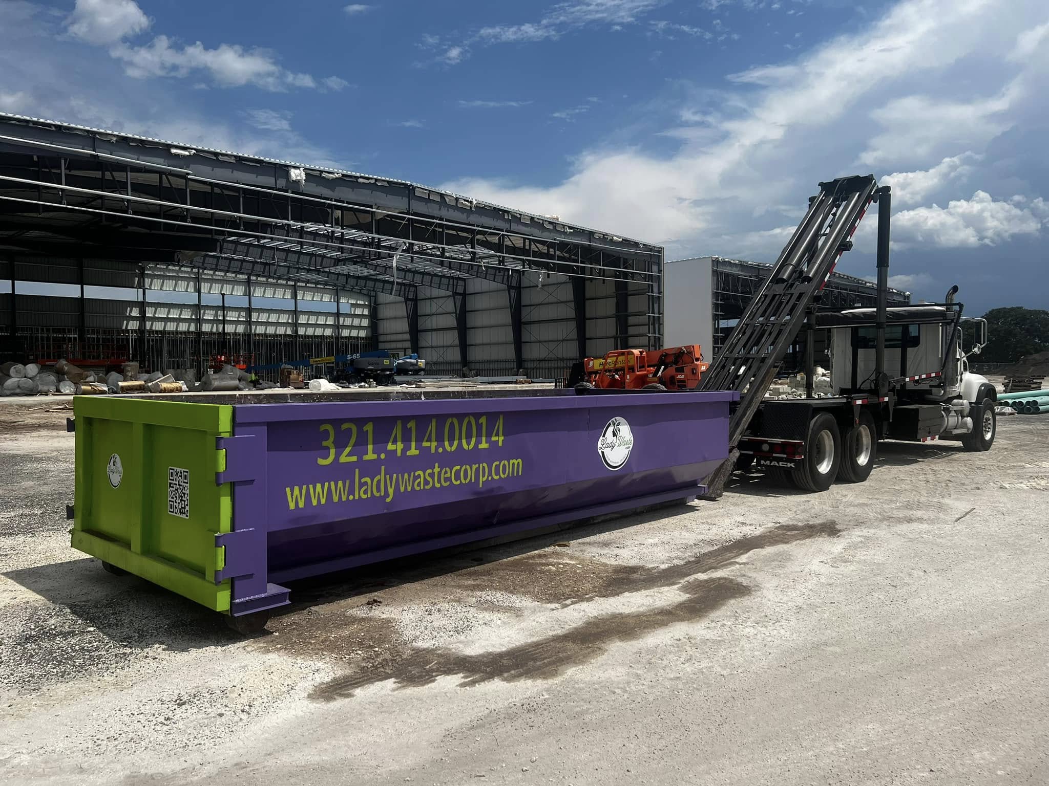 Photo of a commercial dumpster rental from Lady Waste.