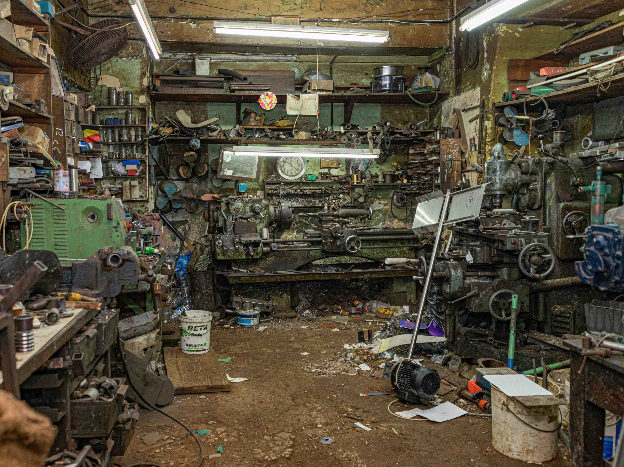 Photo of a garage that needs a clean out.